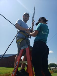 Youth gearing up to go up the tower.